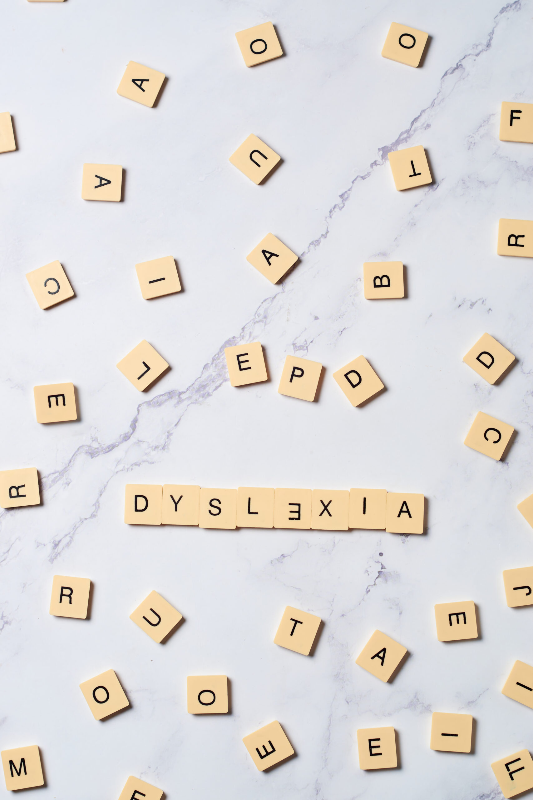 letter tiles spell dyslexia